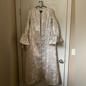 Full length overcoat with bow detail on sleeves